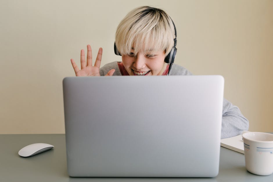 person on a virtual meeting using technology